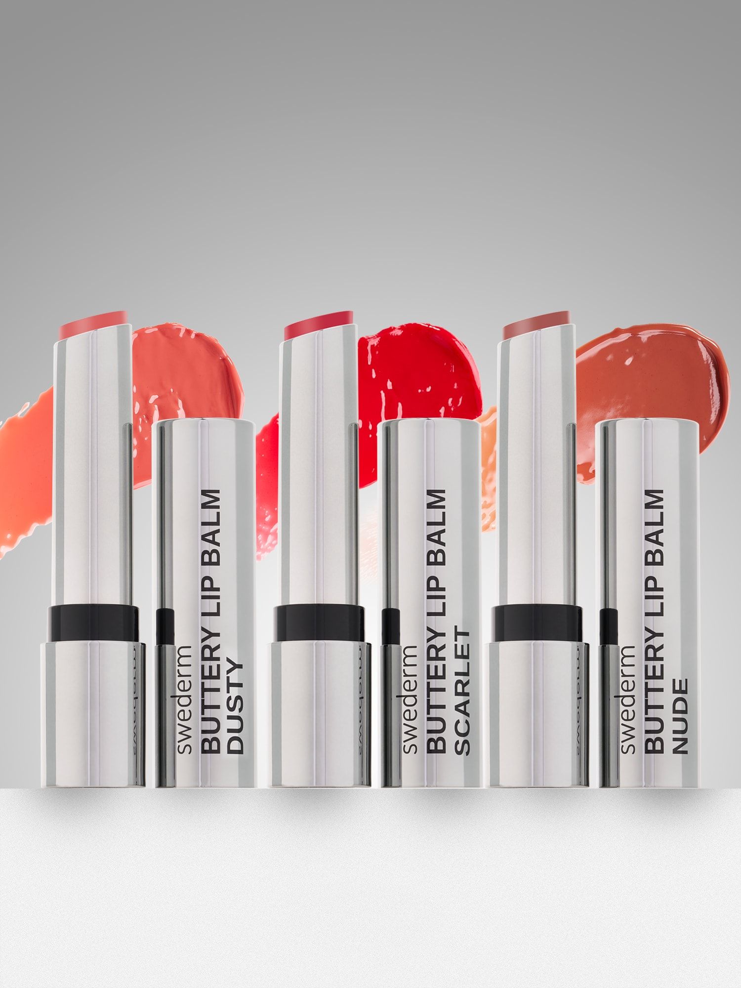 Packshot zestawu pomadek Buttery Lip Balm ze swatchami